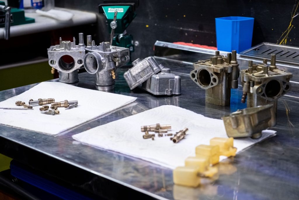 disassembled carburetors from a URAL motorcycle